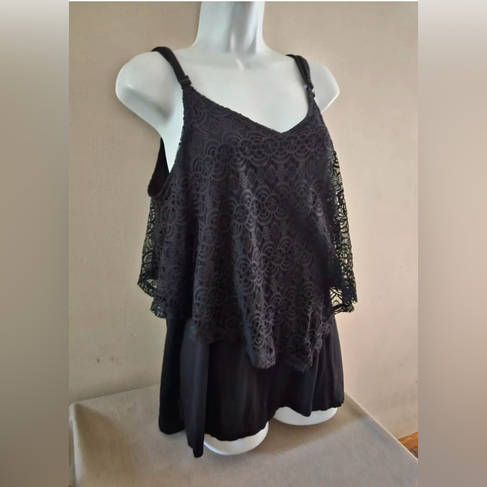 Torrid spaghetti strap layered lace over tank.